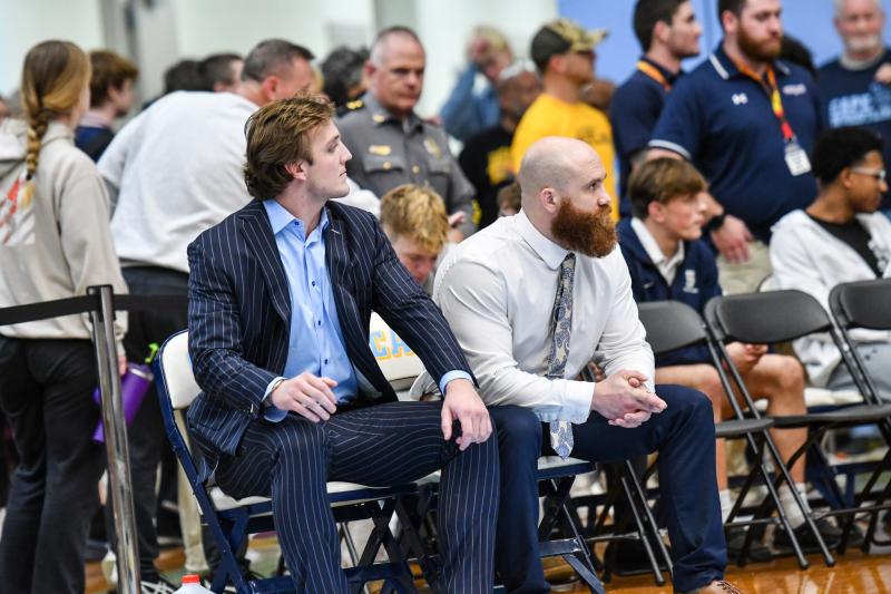 Holden Kammerer and Aaron Mattioni work the corner for Patrick Donahue’s state championship match. DAVE FREDERICK PHOTOS